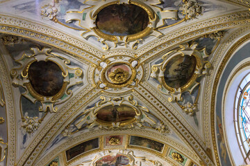 Fototapeta na wymiar Painted ceiling in the old church