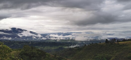 time clouds over the mountains