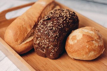 bread whole grain homemade cakes wooden tray breakfast