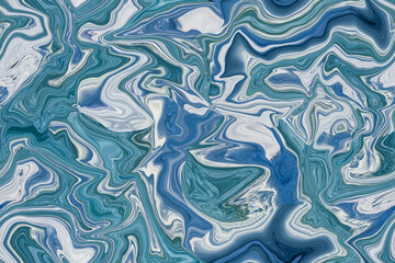 Abstract seamless zigzag pattern background with waves in blue tones. Artistic image processing created by blue sea water photo. Beautiful multicolor pattern for any design. Background image