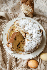 Sliced Easter cake and Easter eggs