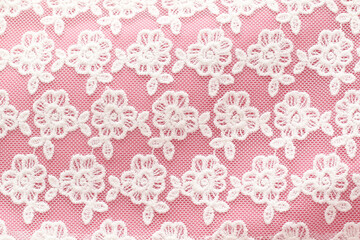 embroidery white flowers on pink background