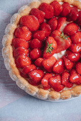 Delicious fresh Charlotte cake with strawberries