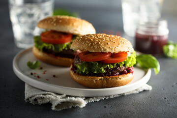 Homemade burgers with cranberry sauce