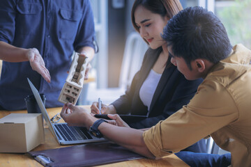 Team designer working graphic packaging design with color chart and materials meeting brainstorm...