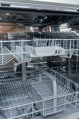 View of the interior of an empty dishwasher