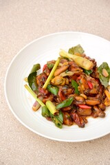 Oseng Kerang Saus Tiram, Indonesian food. Stir-fried mussels with oyster sauce, soy sauce, lemongrass, bayleaf, ginger, garlic and chili.