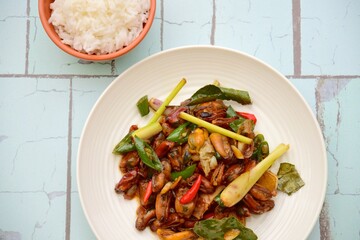 Oseng Kerang Saus Tiram, Indonesian food. Stir-fried mussels with oyster sauce, soy sauce, lemongrass, bayleaf, ginger, garlic and chili.