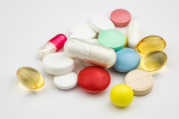 Multicolored tablets on white background. Health care concept.