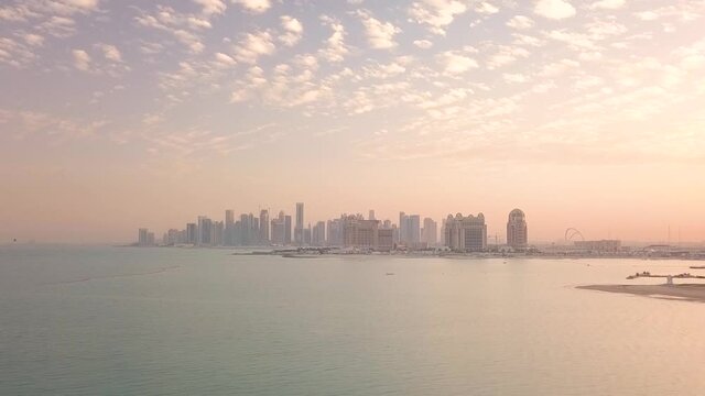 Aerial view of Doha cityscape during sunset, Qatar