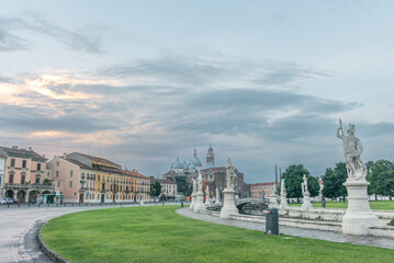 Fototapeta premium Italy, Padua, Prato della Valle, This square is the largest in Italy and features an elliptical canal with statues on both sides.