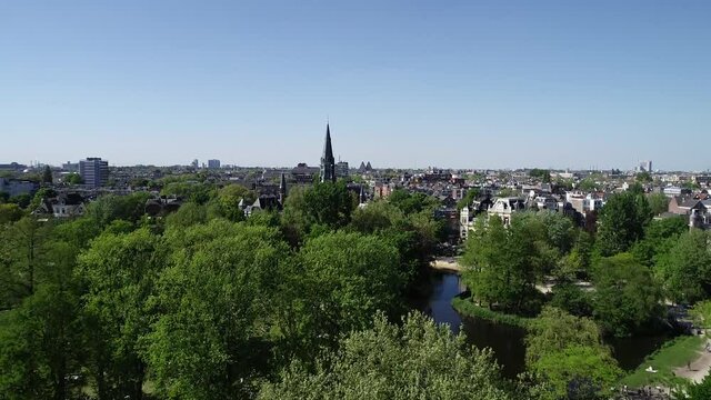 Aerial view of Vondelpark, public park in Amsterdam, Netherlands. Famous place in dutch city to visit. Travel destinations in Europe.