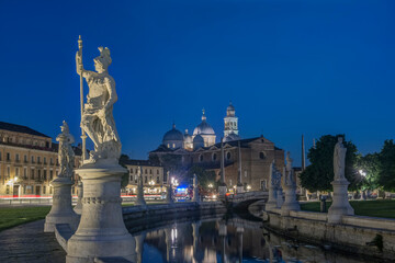 Fototapeta na wymiar Italy, Padua, Prato della Valle, This square is the largest in Italy and features an elliptical canal with statues on both sides.