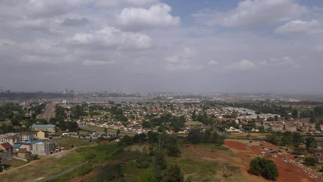 Suburbs and skyline of Nairobi city capital of Kenya, aerial panorama