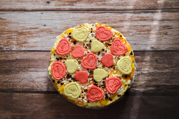 Baked cake with marzipan hearts