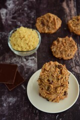Quinoa chocolate cookies on wooden background
