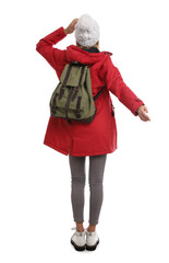 Woman with backpack on white background, back view. Winter travel