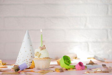 Dog Birthday Cake  with  candle ,bone and confetti . Banner with  copy space .advertising concept .