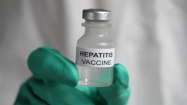 And showing the hepatitis vaccine vile up close