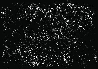 Grunge black background with white splatter. Grainy black texture. Abstract vector illustration
