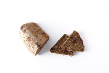 Multigrain triangular bread on a white background. Two pieces and a roll. Useful product.