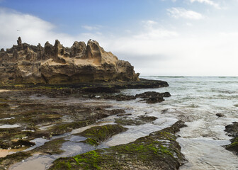 Fototapeta na wymiar Beautiful beach of Brenton-on-Sea with some big rock formations. South Africa.