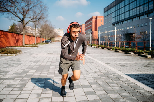 Young caucasian man outdoor running