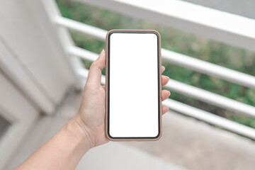 Women's hands holding cell telephone blank copy space screen. smart phone with technology concept