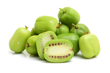 mini kiwi baby fruit (actinidia arguta) on white background 
