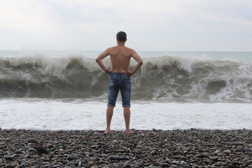 man walking on the beach