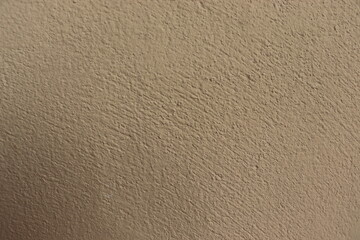 The walls are made of cream stucco, with a rough and rough surface. There is a blank space for the text. Ideas for background.