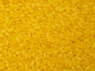 Italian pasta (Gomiti Rigati) on white background