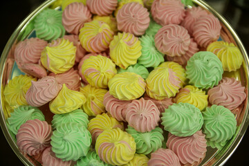 Sweet homemade colorful meringue pastries