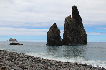 Rocks in the atlantic ocean on a beach in Madeira