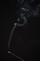 Incense burning giving of different patterns of smoke