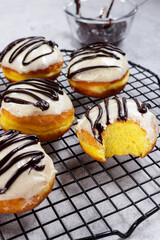 Donat labu or pumpkin doughnuts or donuts is a classic recipe for super soft and fluffy doughnuts made using mashed pumpkin.