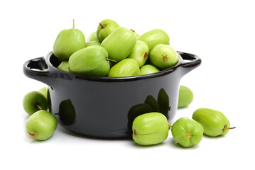 mini kiwi baby fruit (actinidia arguta) on white background 