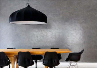 mesa de jantar ou escritório madeira com parede cinzenta, e cadeiras pretas com abajur redondo preto