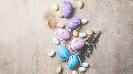 Easter decoration with Easter eggs,  on gray  table. Easter concept with copy space.