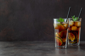 Fototapeta premium Cocktail cuba libre with lime and ice. Rum and cola Alcoholic beverages. Bar. Restaurant.