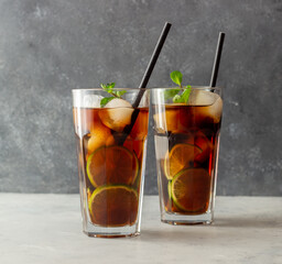Cocktail cuba libre with lime and ice. Rum and cola Alcoholic beverages. Bar. Restaurant.