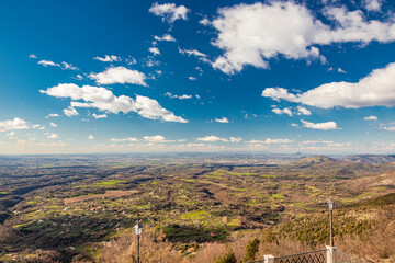 The village of Castel San Pietro Romano, Lazio, province of Rome, Palestrina. The spectacular panorama visible from the top of the town. The valley with the towns, the clear sky with white clouds.