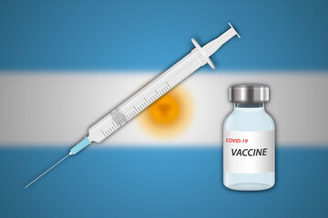 Syringe and vaccine vial on blur background with Argentina flag