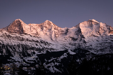 last light on eiger mönch and jungfrau mountain in the bernese alps lauterbrunnen wengen...