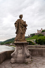 Fototapeta premium Statue of Saint Totnan. Alte Mainbrücke. Würzburg 