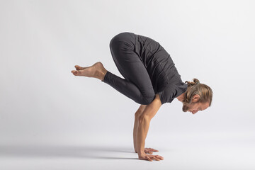 Fototapeta na wymiar (15-104) Crane Pose (Bakasana) Yoga Posture (Asana)