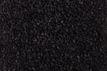black pebbles laid on the floor as an image for making the dark black background.