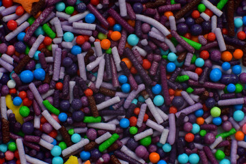 Background Multi-colored Sugar sprinkle dots, decoration for cake and bakery.Easter decoration.Beautiful soft background.