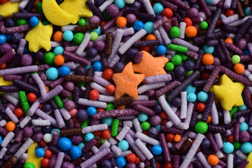 Background Multi-colored Sugar sprinkle dots, decoration for cake and bakery.Easter decoration.Beautiful soft background.