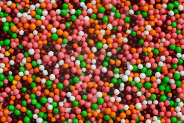 Background Multi-colored Sugar sprinkle dots, decoration for cake and bakery.Easter decoration.Beautiful soft background.